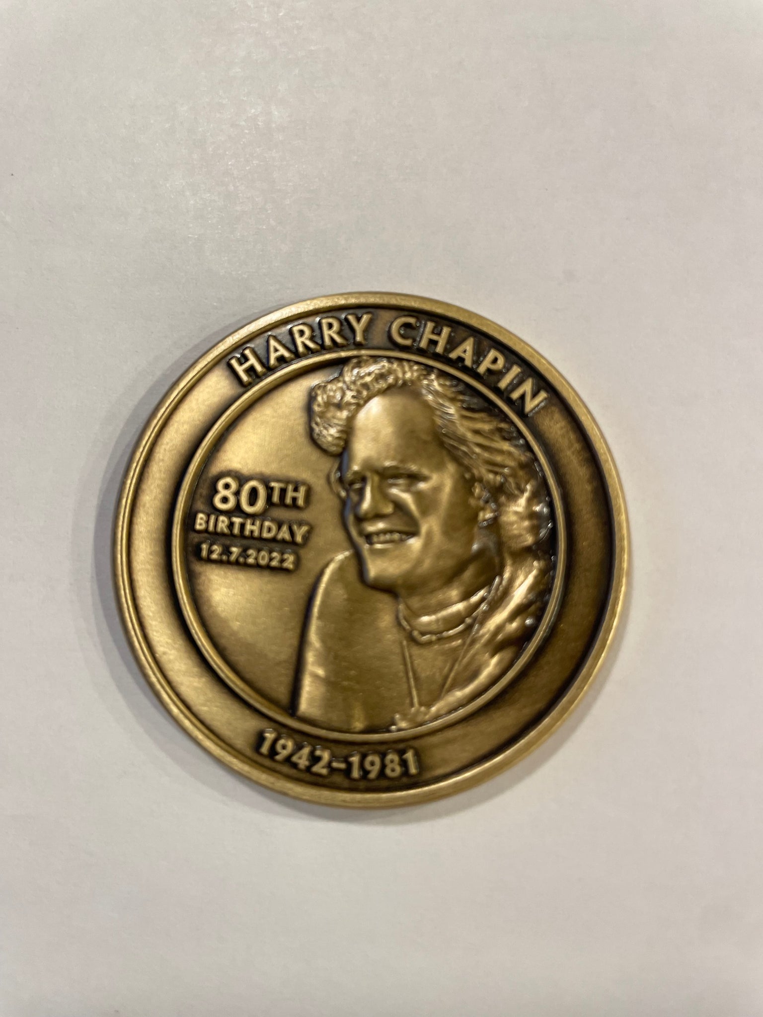 HARRY CHAPIN BRASS COIN COMMEMORATING HIS 80th BIRTHDAY Harry Chapin Harry chapin brass coin commemorating his 80th birthday harry chapin